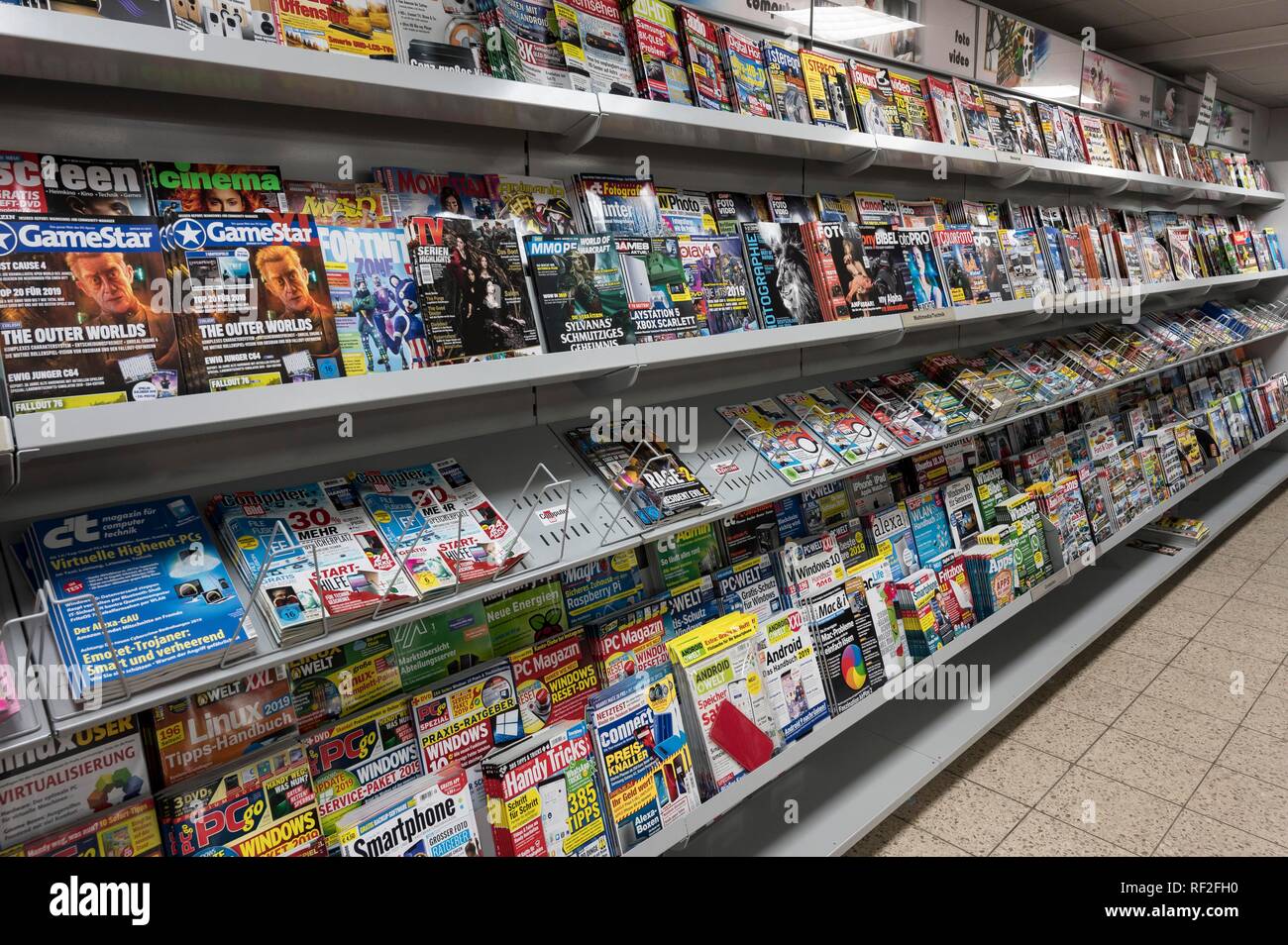 Shelves with magazines in supermarkets, Munich, Upper Bavaria, Bavaria, Germany Stock Photo