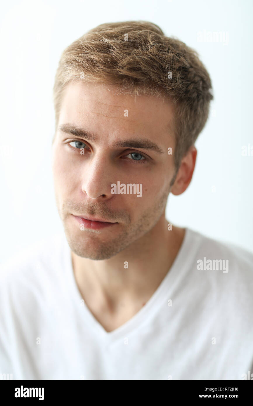 Handsome guy in the bathroom Stock Photo - Alamy