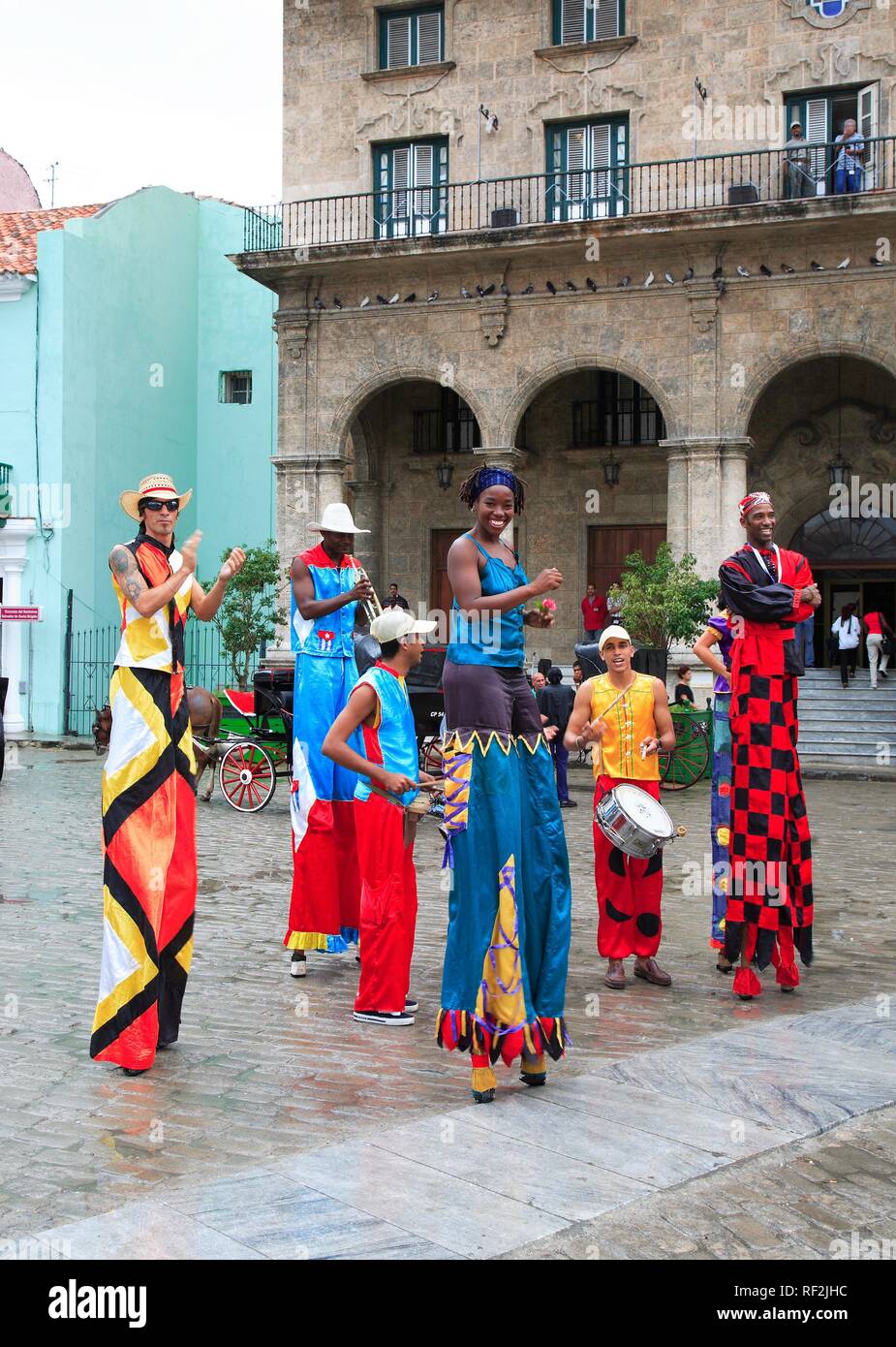 Masked people on stilts during carnival in Havana, Cuba, Caribbean Stock Photo