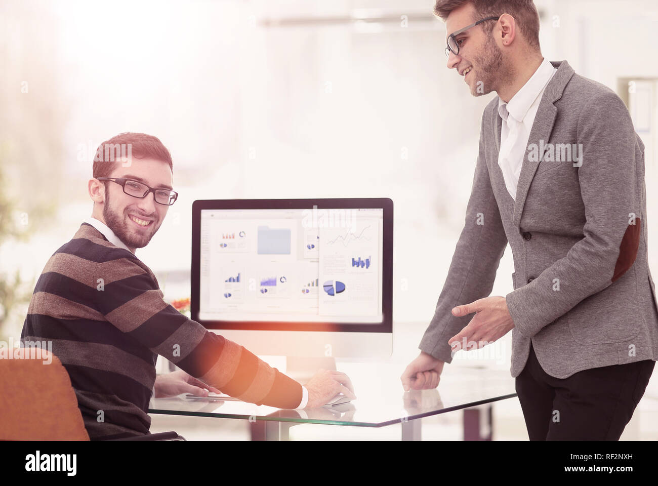 two businessmen analyzing stats financial data Stock Photo