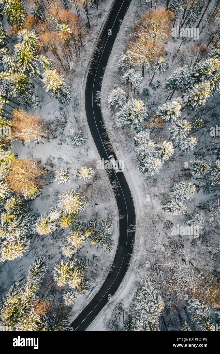 Truck on road after a heavy snowfall in mid winter season Stock Photo