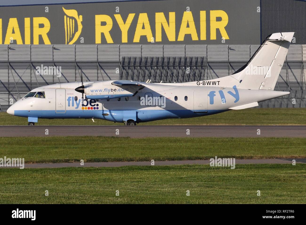 FLYBE (operated by Loganair) DORNIER Do-328 COMMUTER AIRLINER Stock Photo