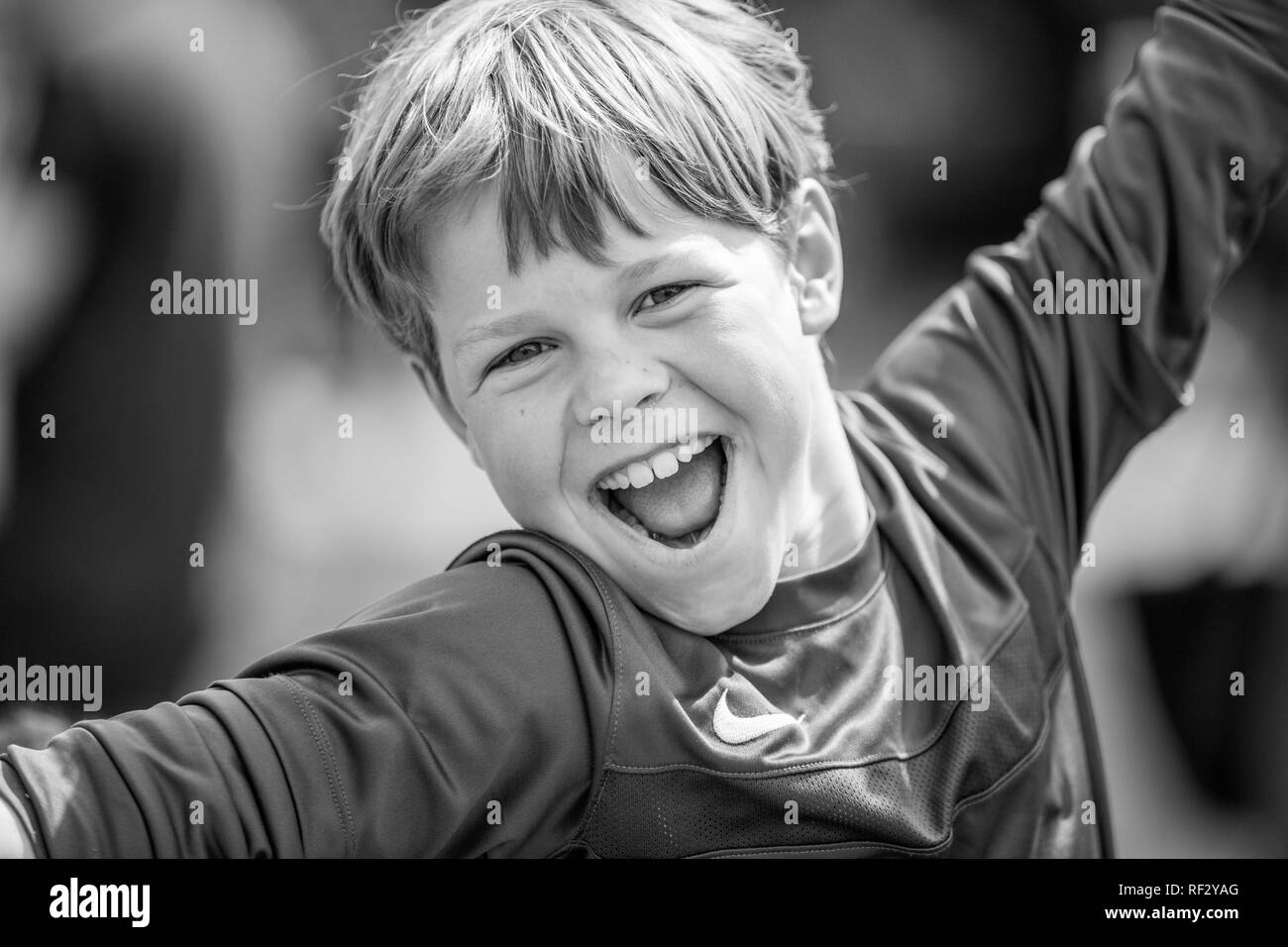 A young boy celebrating a win at a dog show. Stock Photo