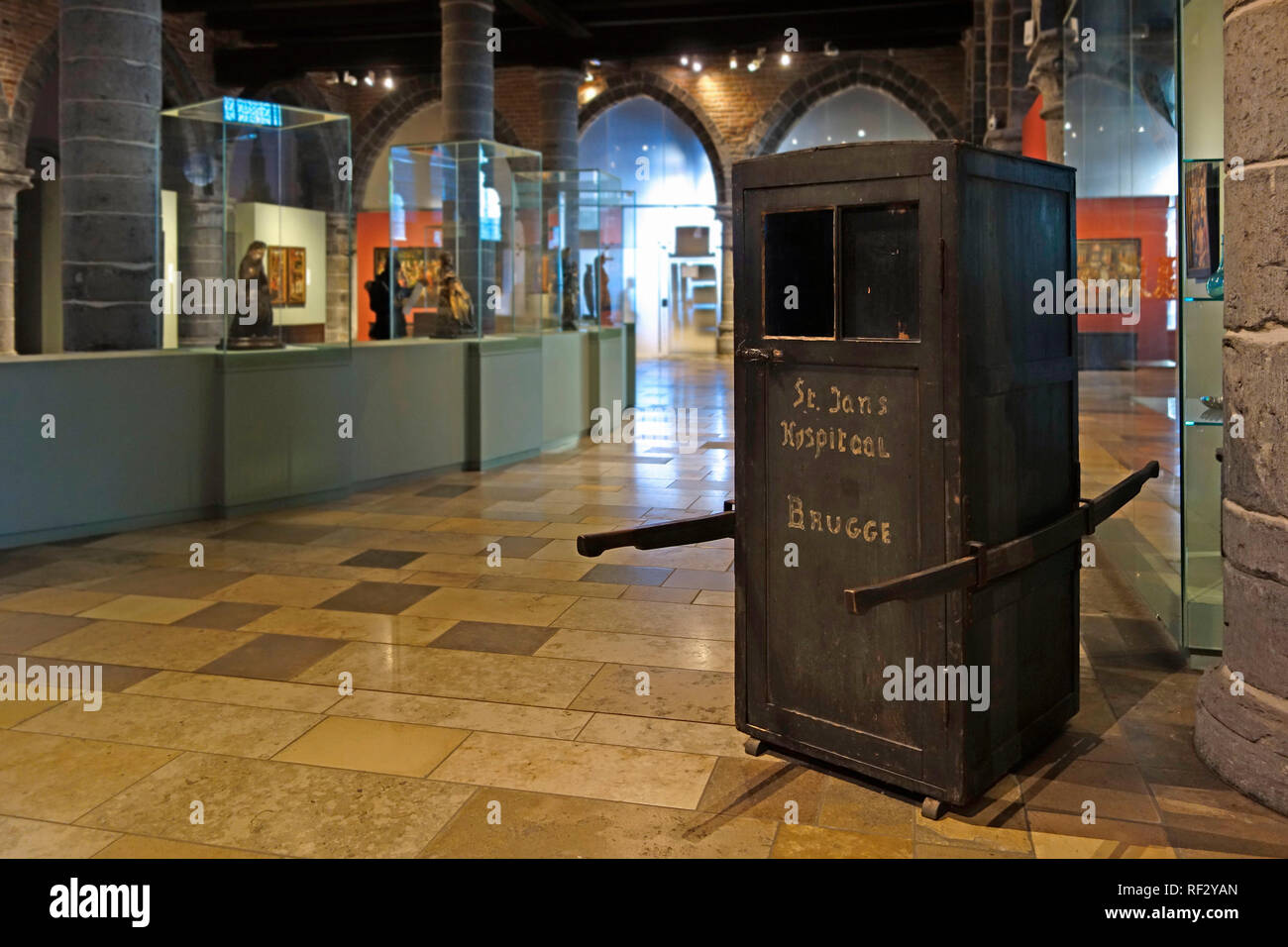 Medieval ambulance / sedan chair in the old sick-bay at the medieval Sint-Janshospitaal / St John’s Hospital in the city Bruges, Flanders, Belgium Stock Photo