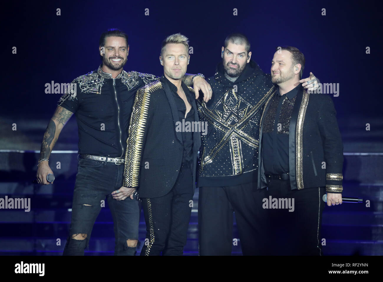 (left to right) Keith Duffy, Ronan Keating, Shane Lynch and Mikey Graham of Boyzone on stage at the SSE Arena, Belfast, as part of the band's Thank You & Goodnight farewell tour. Stock Photo
