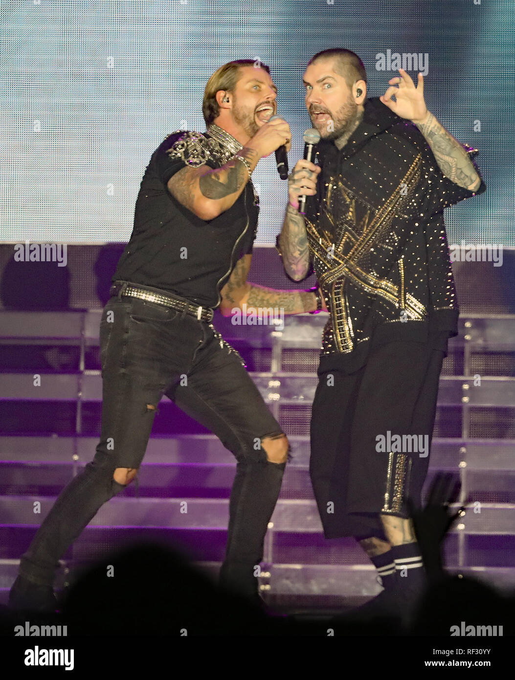 EDITORIAL USE ONLY (left to right) Keith Duffy and Shane Lynch of Boyzone on stage at the SSE Arena, Belfast, as part of the band's You & Goodnight tour Stock
