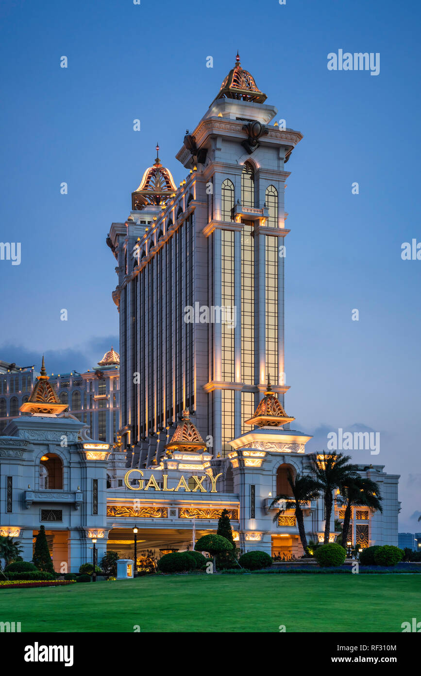 The Galaxy Hotel exterior architecture illuminated at night in Macau ...