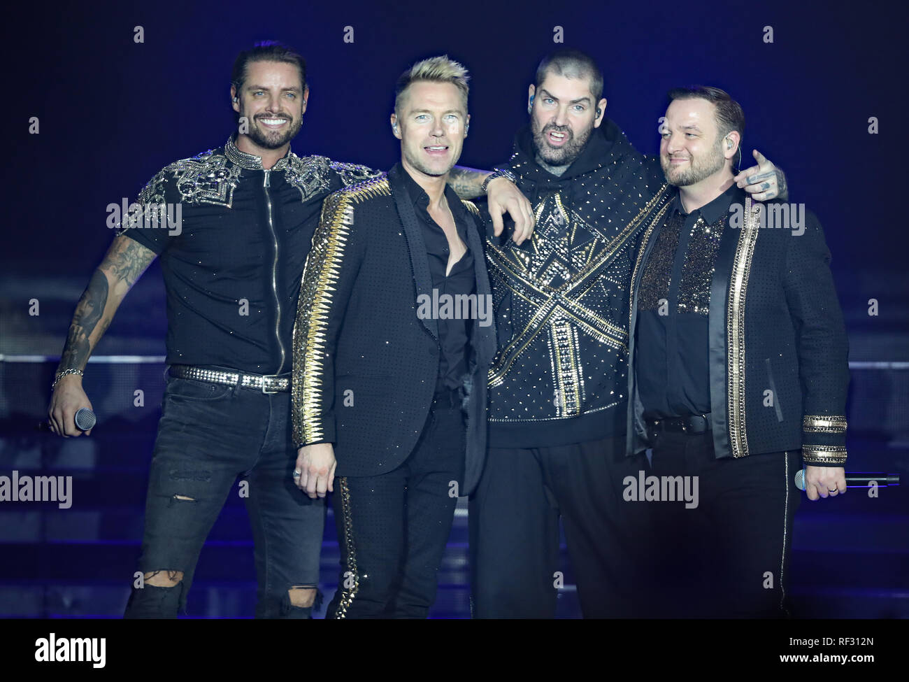 EDITORIAL USE ONLY (left to right) Keith Duffy, Ronan Keating, Shane Lynch  and Mikey Graham of Boyzone on stage at the SSE Arena, Belfast, as part of  the band's Thank You &