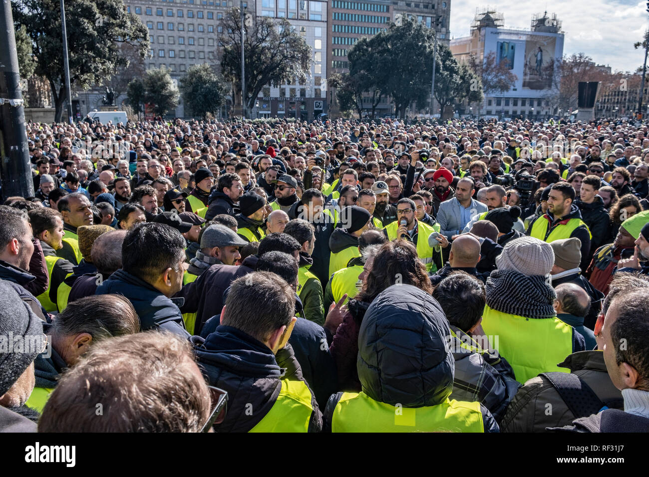 seen A ... large drivers the assembly. of group taxi The during assembly. the large group during taxi A drivers seen ... of The