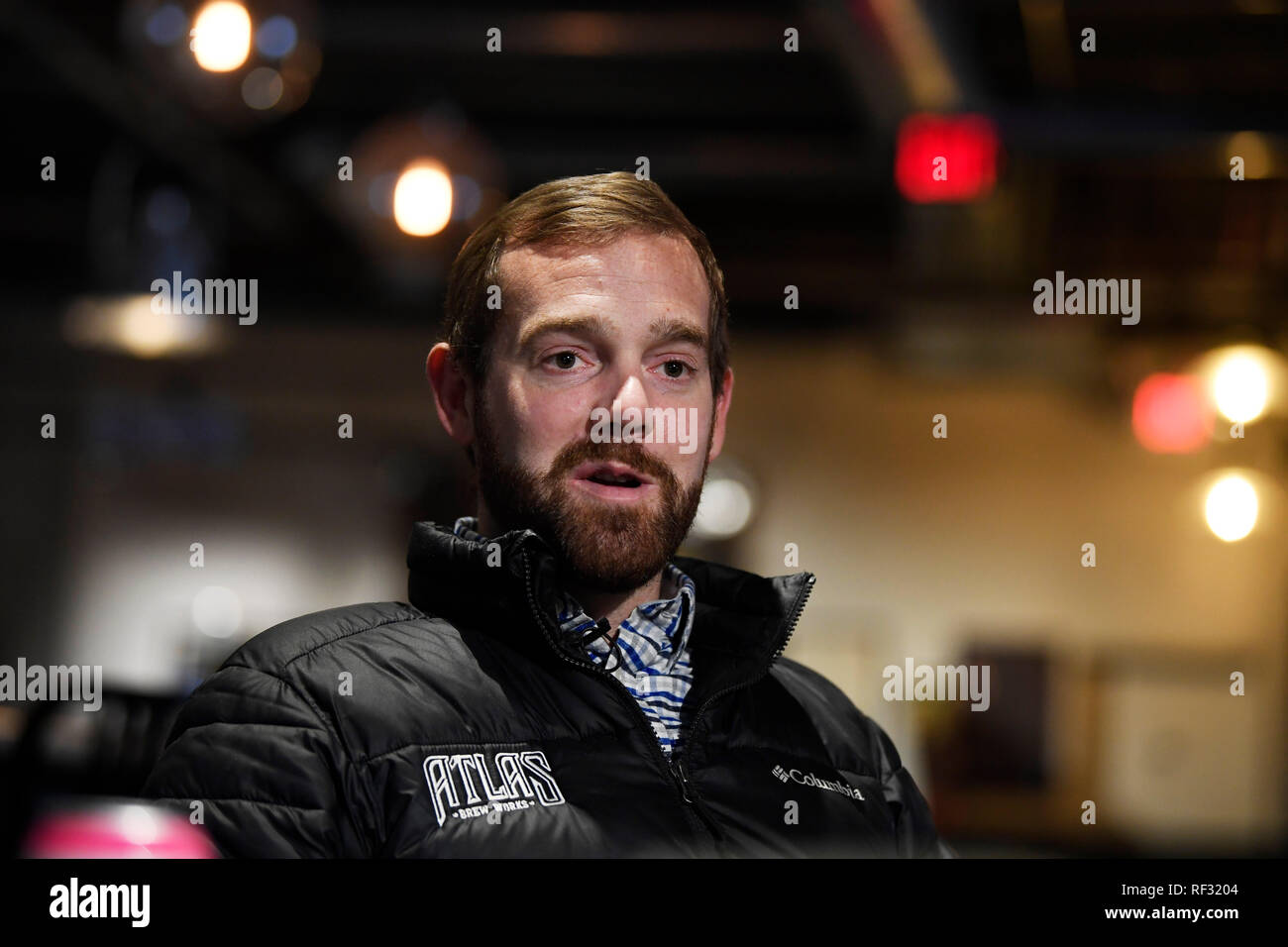 (190123) -- WASHINGTON, Jan. 23, 2019 (Xinhua) -- Justin Cox, owner of a craft brewing business, is interviewed in Ivy City in northeastern Washington, DC, the United States, Jan. 17, 2019. Located in the community of Ivy City in northeastern Washington, DC, Justin Cox's 12-feet-tall (around 3.66 meters tall) brewery has 14 production tanks, with a strong hop aroma filling the air. His craft brewing business has been running smoothly for over five years until just recently. Without approved labels from the federal government, kegs of apricot-flavored India Pale Ale (IPA) have piled up in his Stock Photo