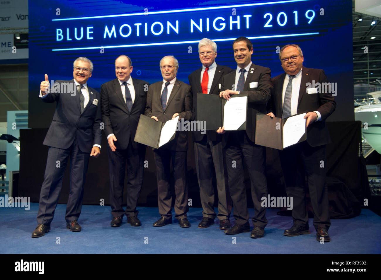 Presenting the new cooperation agreement for the continuation of the Aûocean tribute, Aú Award over the next three years: from left: Petros MICHELIDAKIS, Head of the BOOT, Fuerst ALBERT II of Monaco, Vice-President of the First Albert II Foundation, HE Bernard Fautrier, (3.left to right) Exhibition Manager Werner M. Dornscheidt (right), the Management of the Deutsche Meeresstiftung, Frank Schweikert, and the representative of the Albert II Foundation in Germany, Dr. Ing. Bernd Kunth, Blue Motion Night and presentation of the Ocean Tribute Award at the boat show 2019, boat show 2019 in Duesseld Stock Photo