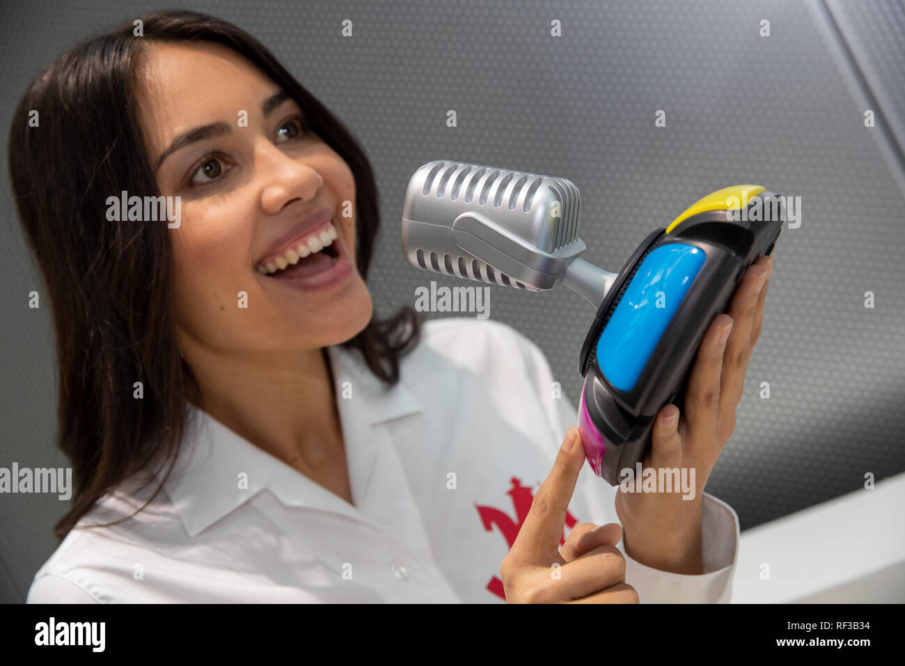 Numberg, Germany. 24th Jan, 2019. Model Jennifer presents Hutter's Sound Jack at the press conference for the International Toy Fair 2019 in the Exhibition Centre Nuremberg. In the game, players are asked to answer questions on over 400 snippets of sound. The toy is nominated in the category 'Startup' for the 'Toy Award'. The world's largest toy fair takes place this year from 30 January to 03 February 2019. Photo: Daniel Karmann/dpa Credit: dpa picture alliance/Alamy Live News Stock Photo