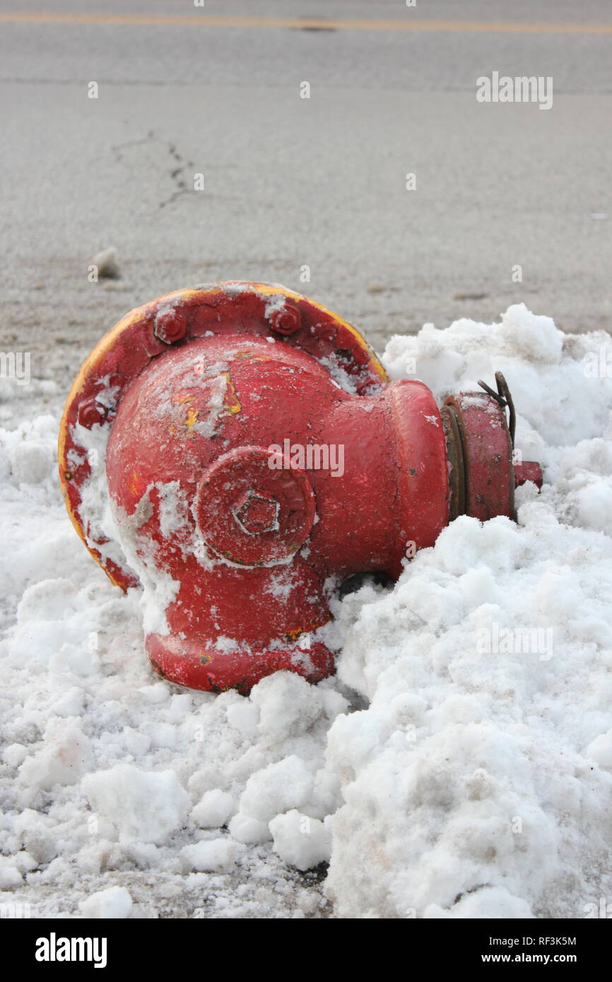 Broken fire hydrant that has been sheared off during a bad traffic