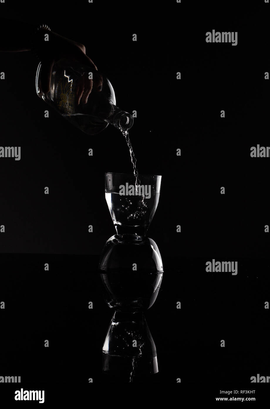 backlight glass and alcohol Stock Photo