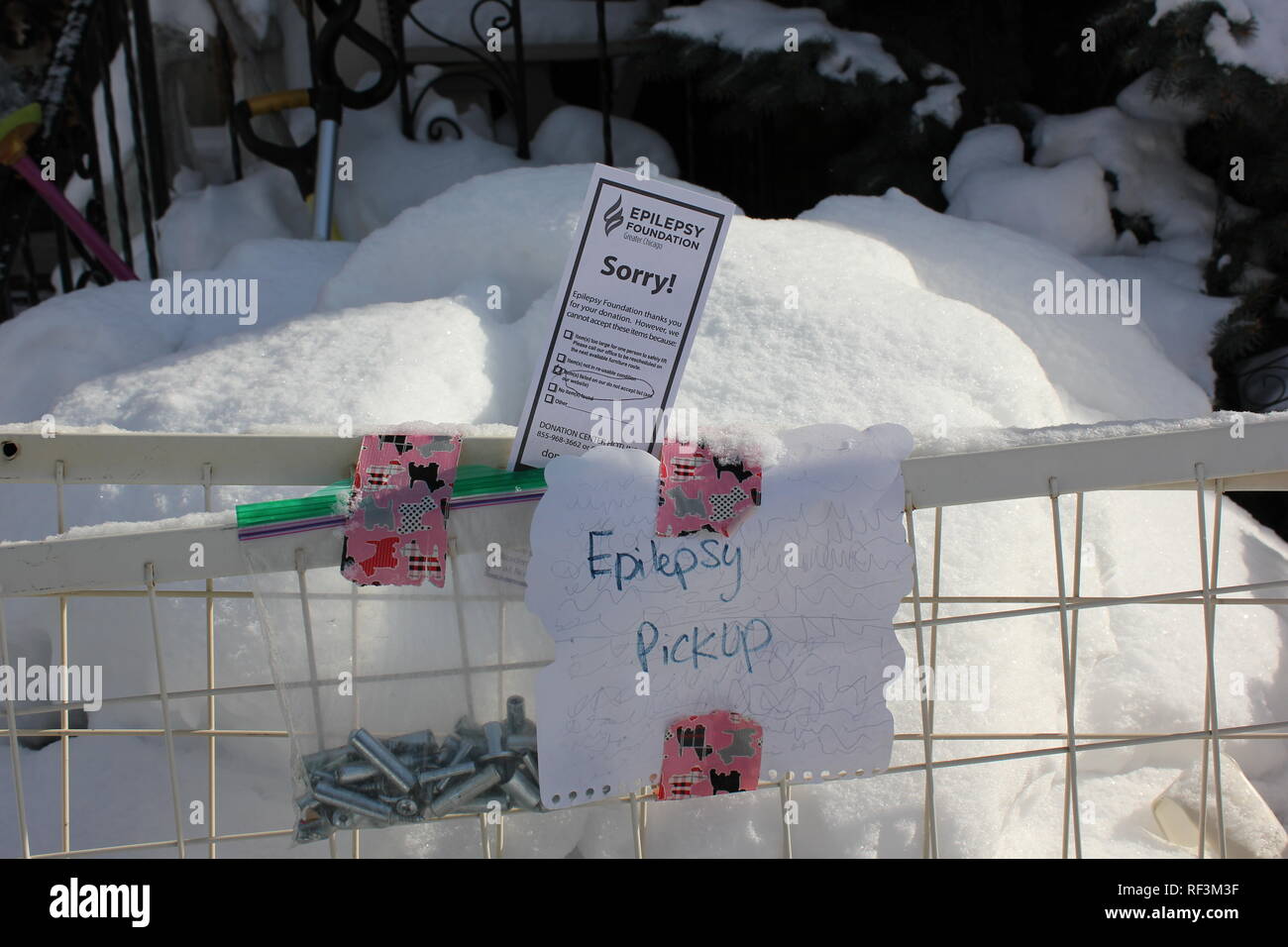 Epilepsy donation pickup slip tagged on a donated bunk bed that they