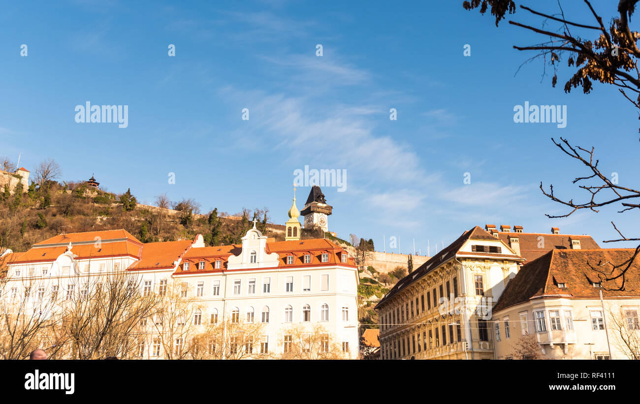 Graz, Styria / Austria - 20.01.2019: View at Schlossberg hill with fortress and clock-tower Uhrturm. Travel destination. Stock Photo