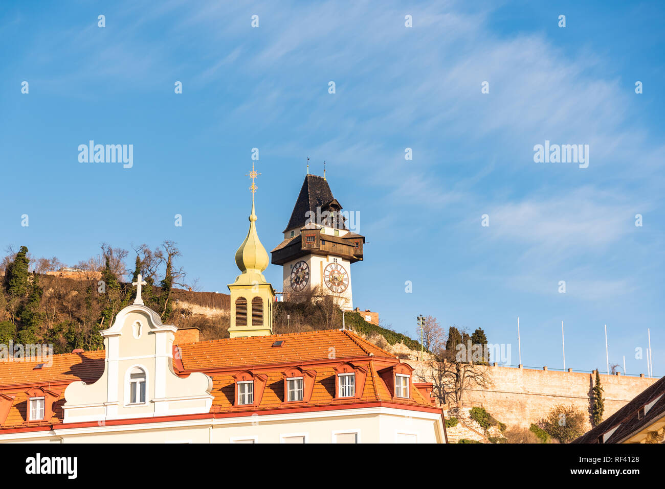 Graz, Styria / Austria - 20.01.2019: View at Schlossberg hill with fortress and clock-tower Uhrturm. Travel destination. Stock Photo