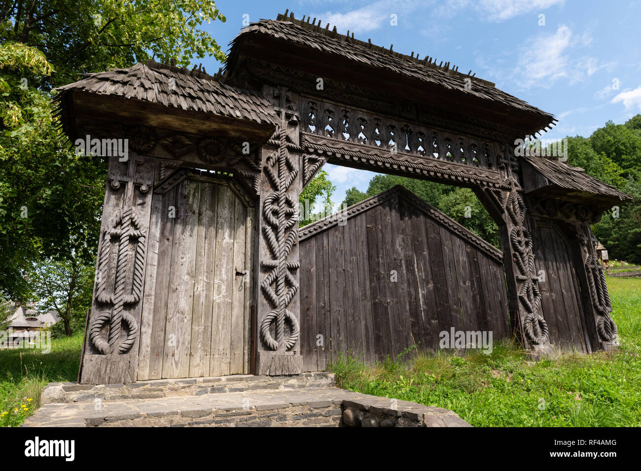 Barsana Monastery Architectural Detail - Traditional Wooden Carved Gate (Maramures, Romania). Stock Photo