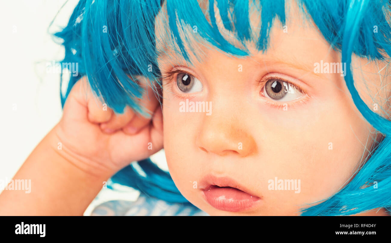 Funky beauty. Small child wear blue wig hair. Small kid in fancy wig  hairstyle. Adorable little child in fashion wig. Cute baby with long blue  hair. Beauty look hairstyle for cosplay party
