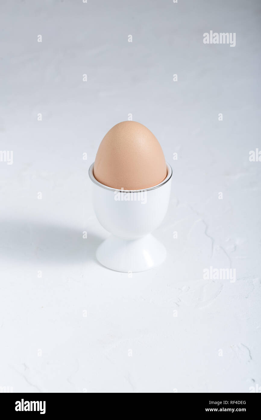 Boiled egg breakfast on white background, copy space Stock Photo