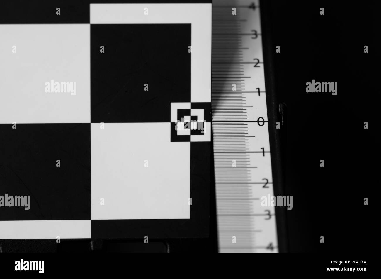 Autofocus lens calibration. Tool for checking focus of the lens. Black