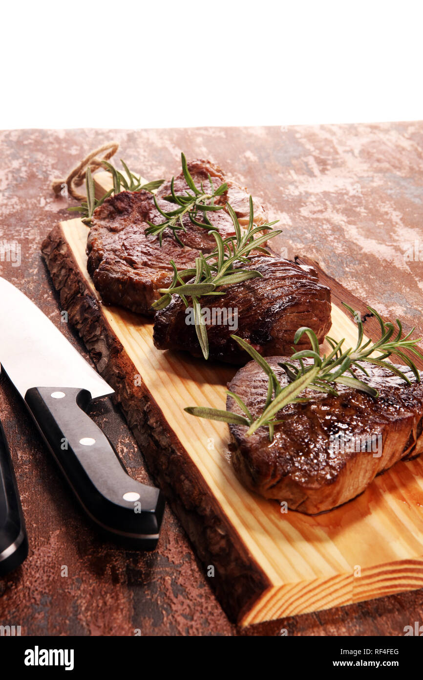Barbecue Rib Eye Steak. Black Angus Prime meat steaks Machete, Striploin, Rib eye, Tenderloin fillet mignon Stock Photo