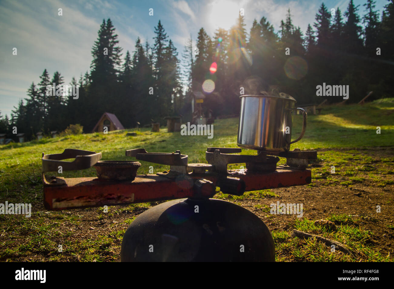 Boiling steaming water in the mountain for tea and coffee Stock Photo