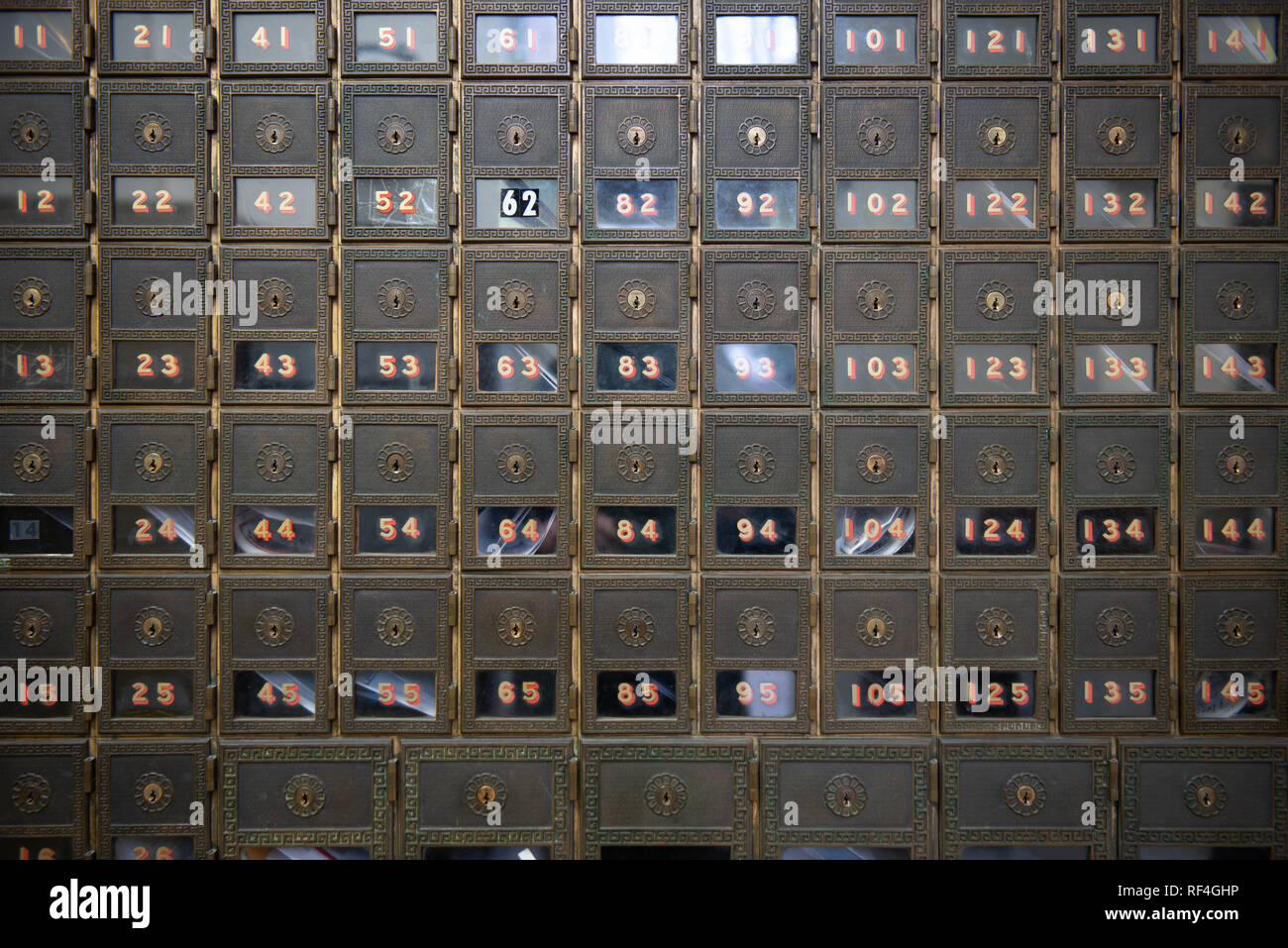 PO boxes an a post office that uses a key to unlock the po boxes Stock
