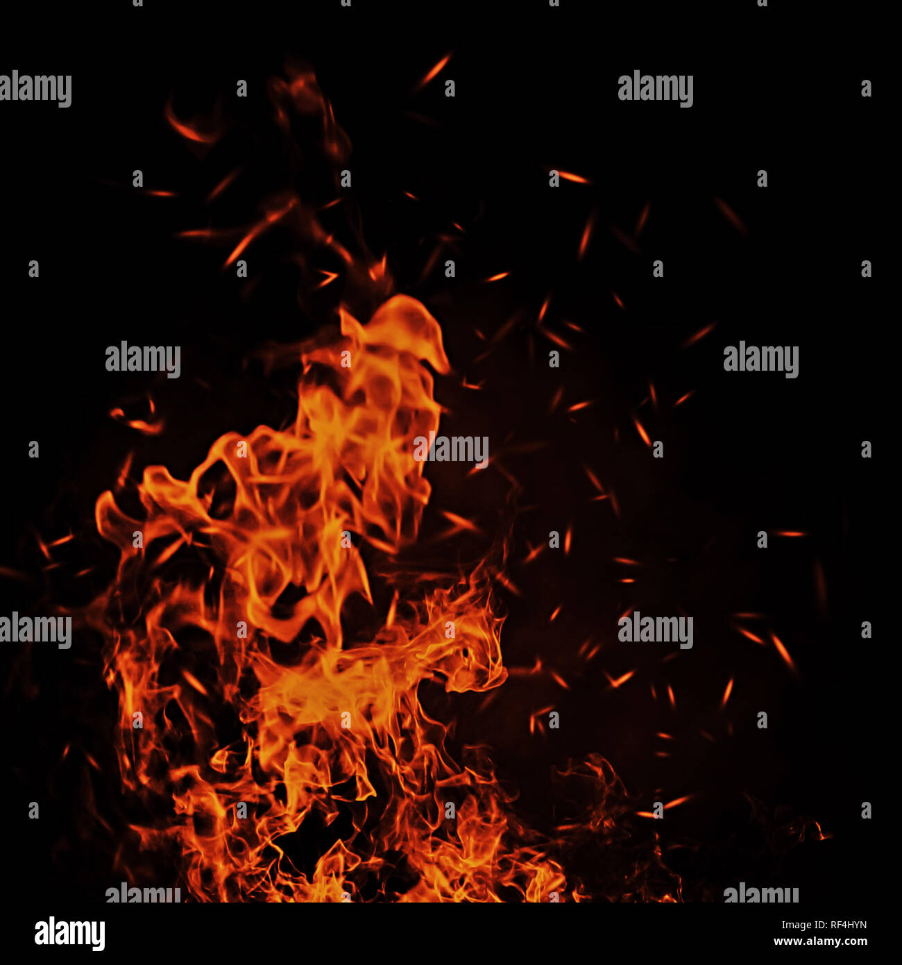 Vintage abstract flames with fire particles embers on isolated background. Stock Photo