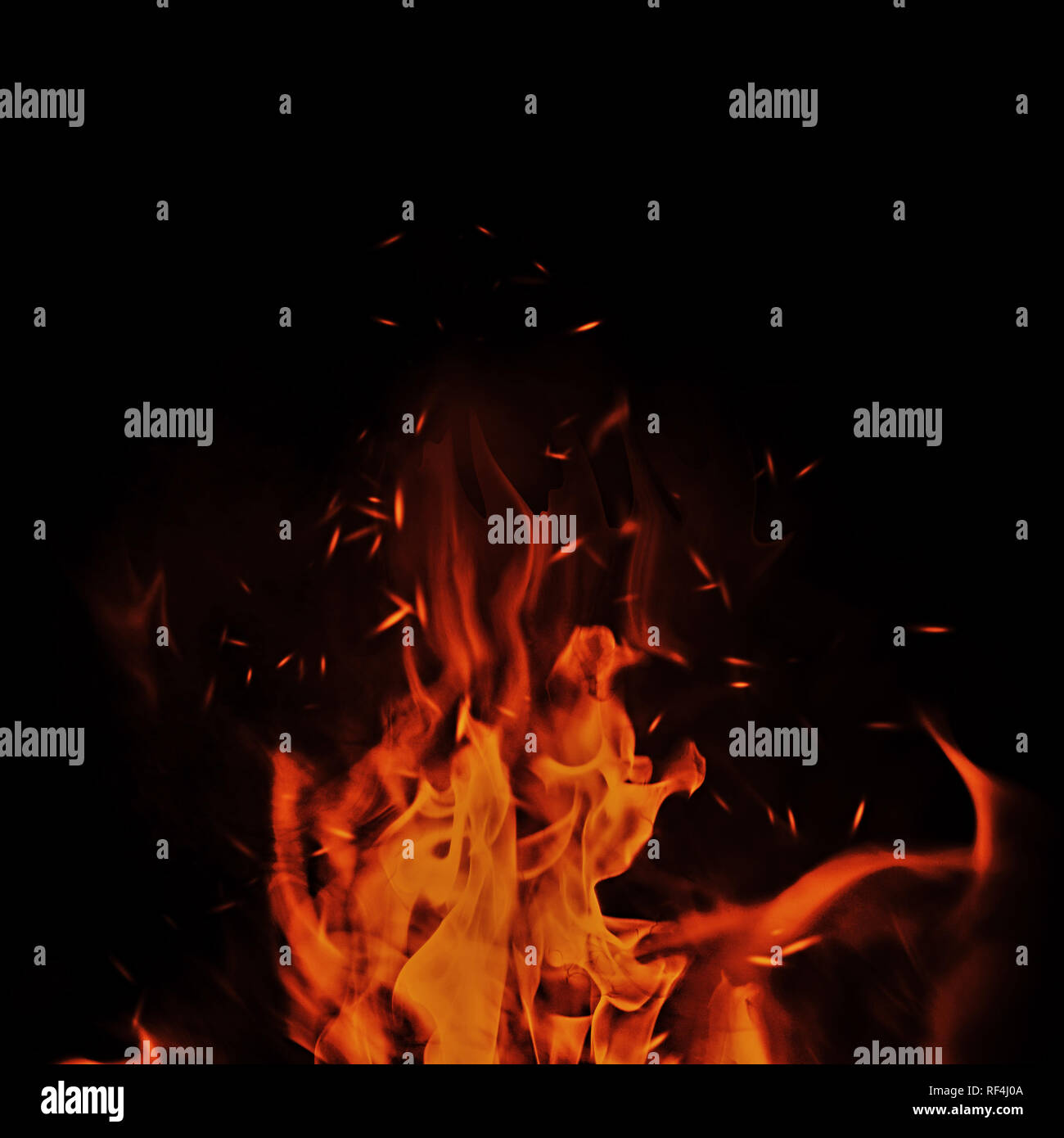 Vintage abstract flames with fire particles embers on isolated background. Stock Photo