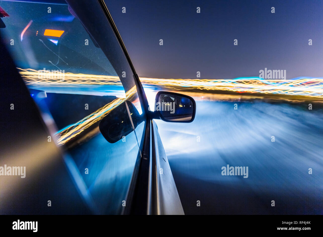 Car going around a corner hi-res stock photography and images - Alamy