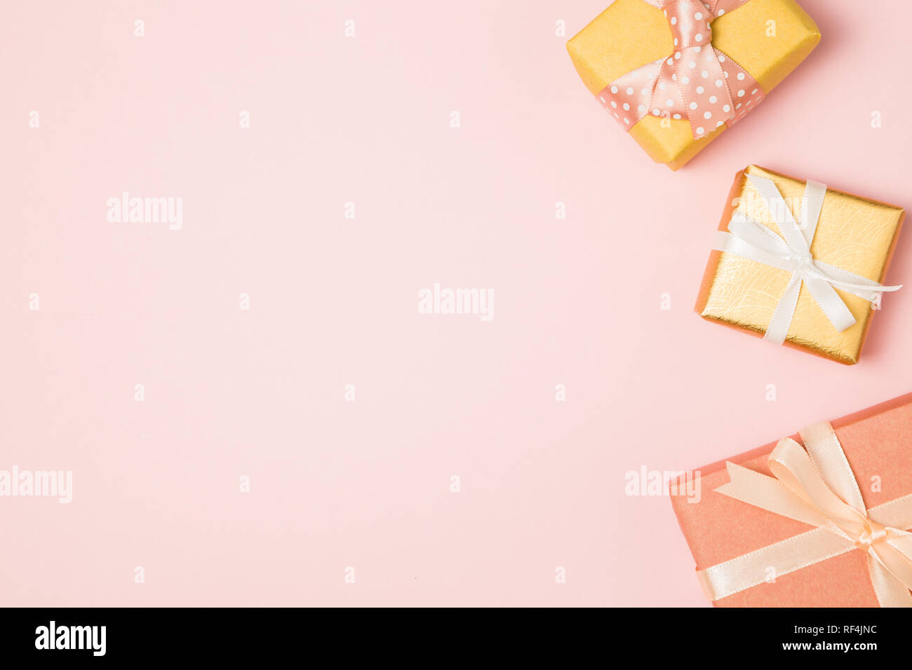 Gift boxes on pink background Stock Photo