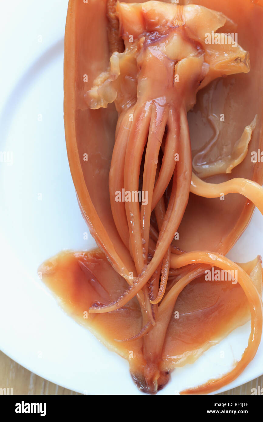 Close up of soaked dried squid on white plate Stock Photo