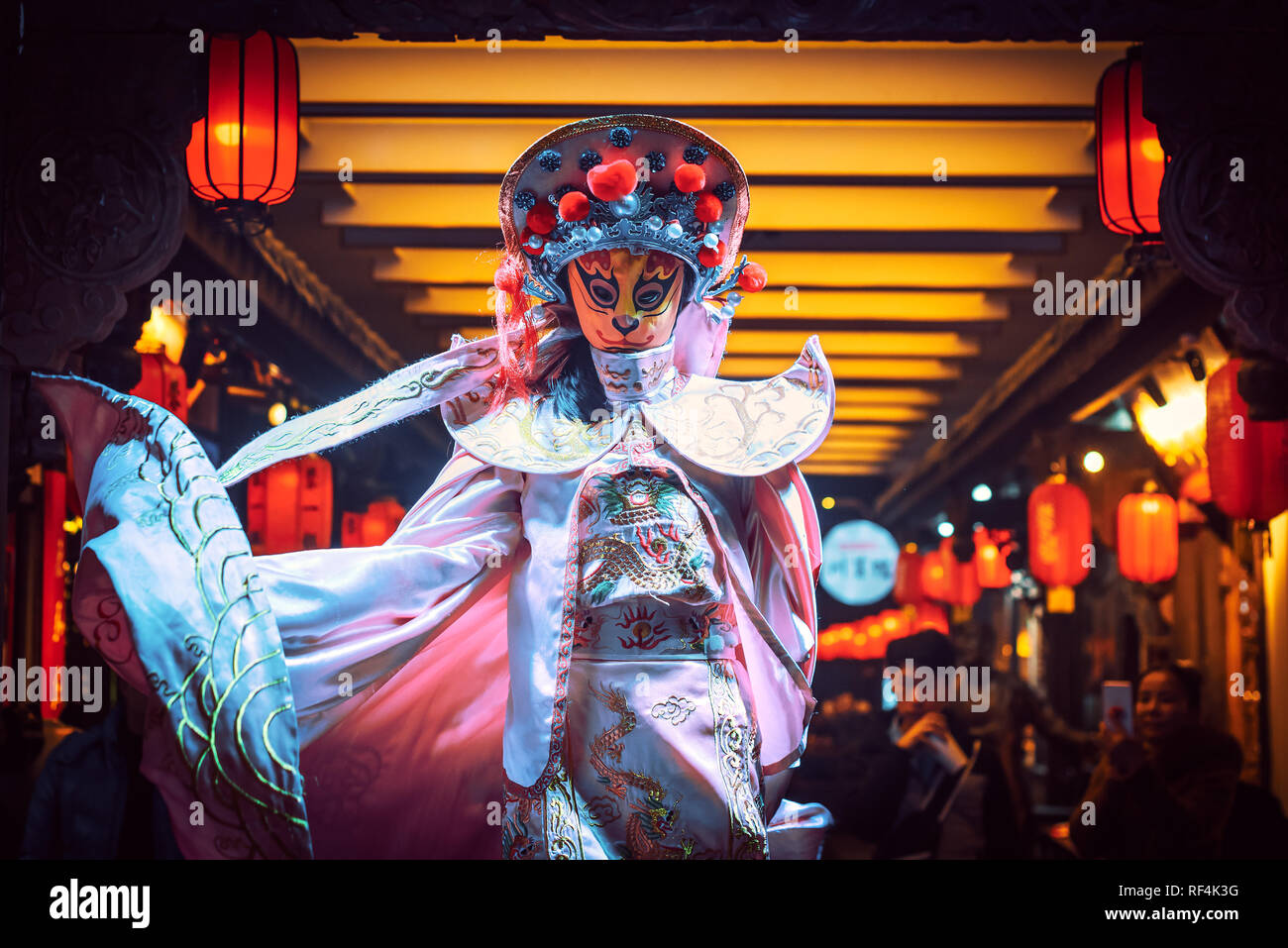 Chengdu, Sichuan Province, China - Jan 19, 2019: Chinese actress performs a public traditional face-changing art or bianlian onstage at Chunxifang Chu Stock Photo
