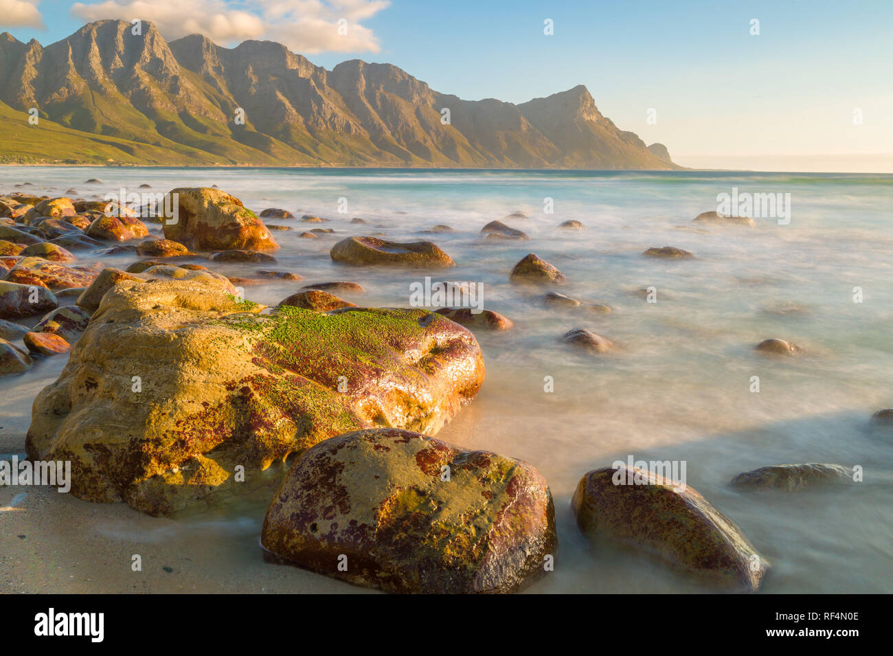 Kogel Bay is on the Indian Ocean between Gordon's Bay and Rooi Els and features kilometers of undeveloped sandy beach amid mountains and fynbos Stock Photo