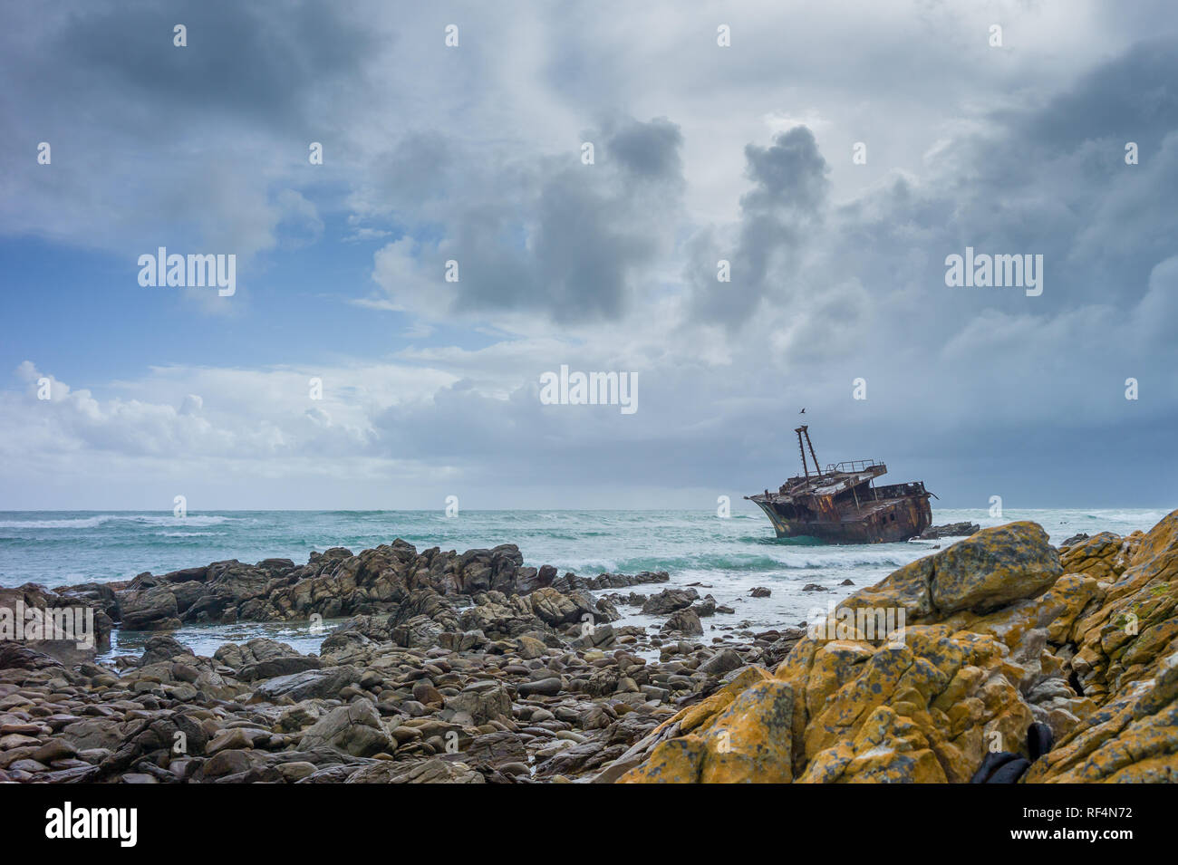Cape Agulhas is notoriously dangerous for ships and despite the nearby lighthouse, the Meisho Maru no 38, a small Japanese fishing vessel, ran aground Stock Photo