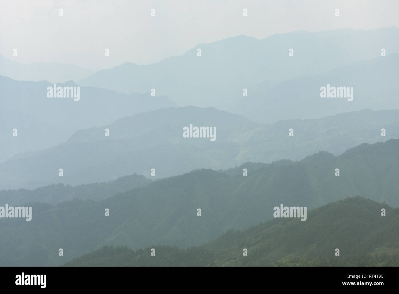 Landscape layers mountains in haze Stock Photo Alamy