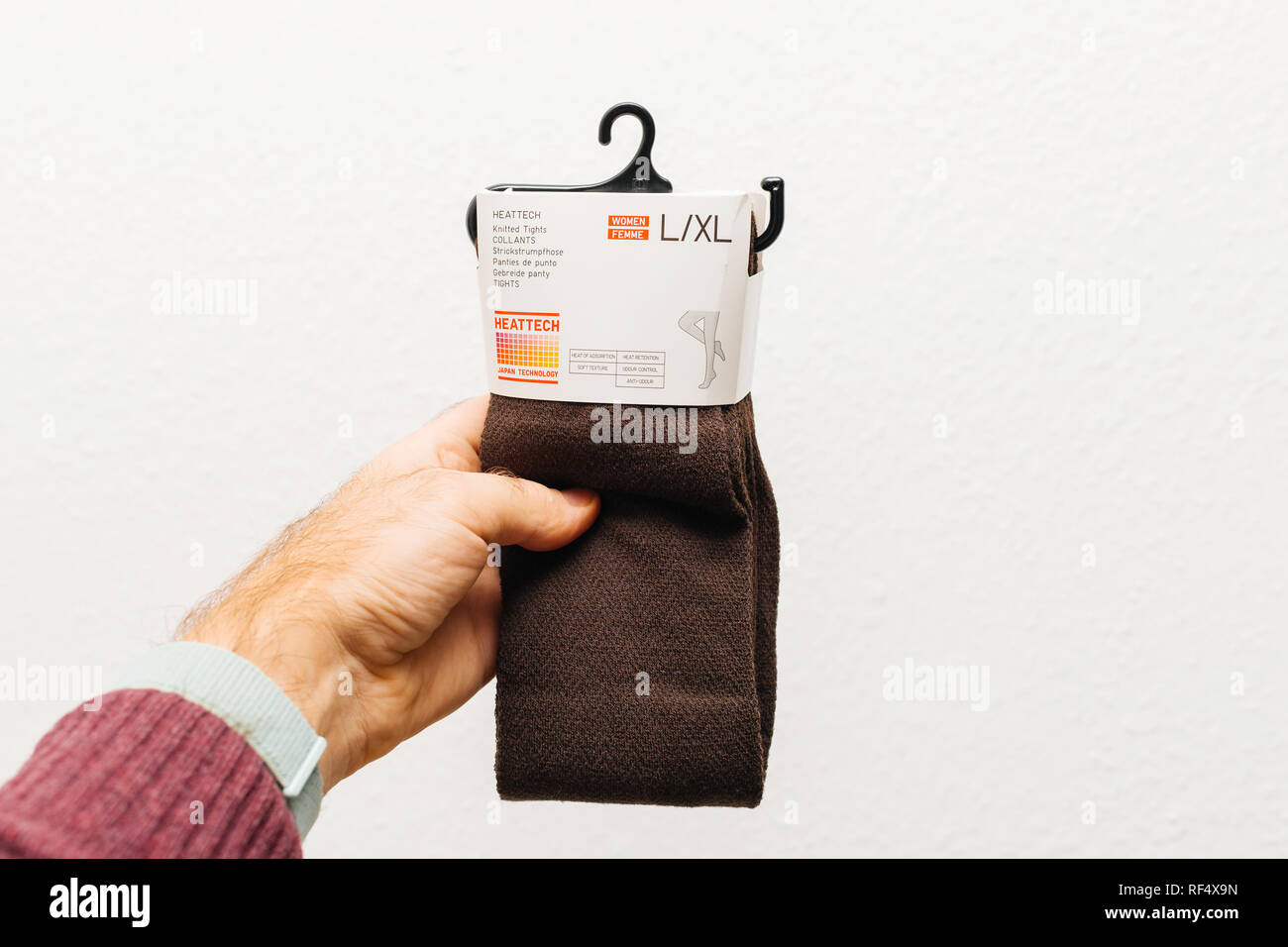 Paris, France - Dec 21, 2018: Man holding against white background a new  package with Heattech knitted tights manufactured by Uniqlo Japanese casual  wear designer, manufacturer and retailer Stock Photo - Alamy