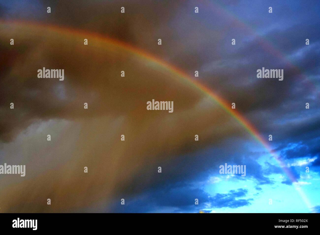 A rainbow appears in Phoenix, Arizona after a rain storm Stock Photo ...