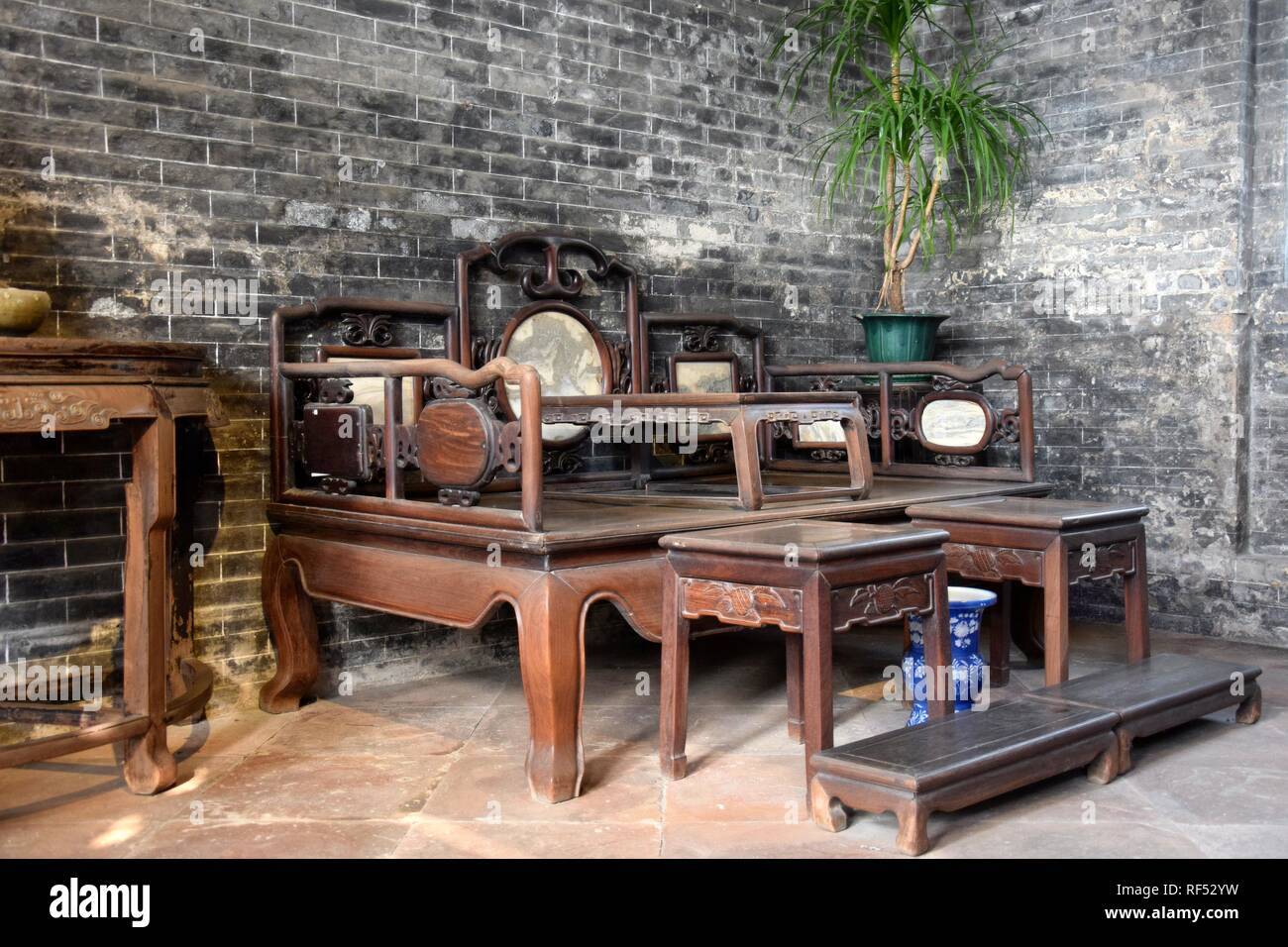 Interior with antique wooden furniture. Traditional room of wealthy