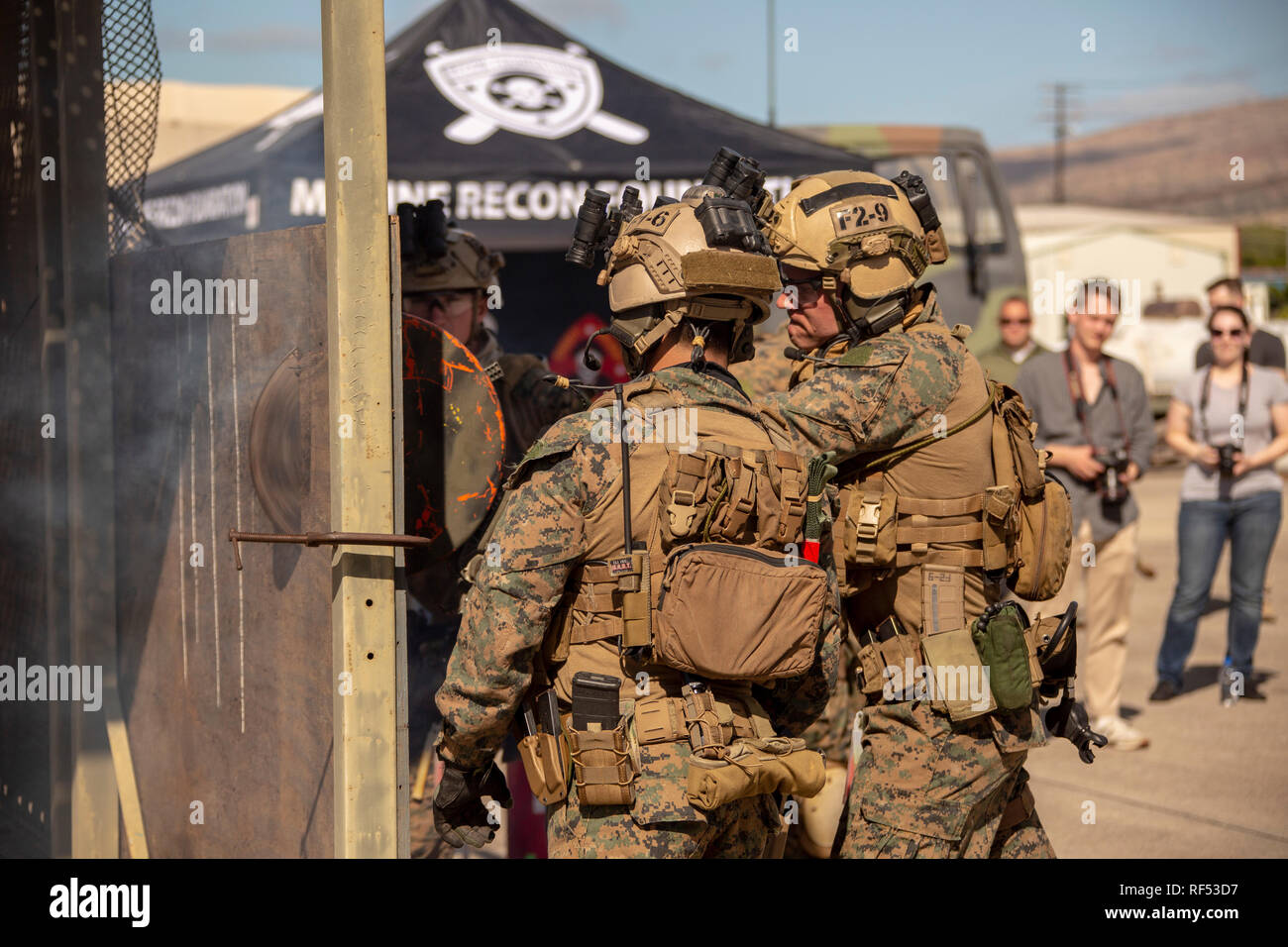 U.S. Marines and Sailors with Maritime Raid Forces, 31st Marine Expeditionary Unit showcase tactical capabilities at Kalaeloa Airport, Hawaii, Jan. 19, 2019. The MEU invited the public to attend a free tactical demonstration and gave them an opportunity to meet the Marines and view the equipment used during the events. (U.S. Marine Corps photo by Lance Cpl. Eric Tso.) Stock Photo