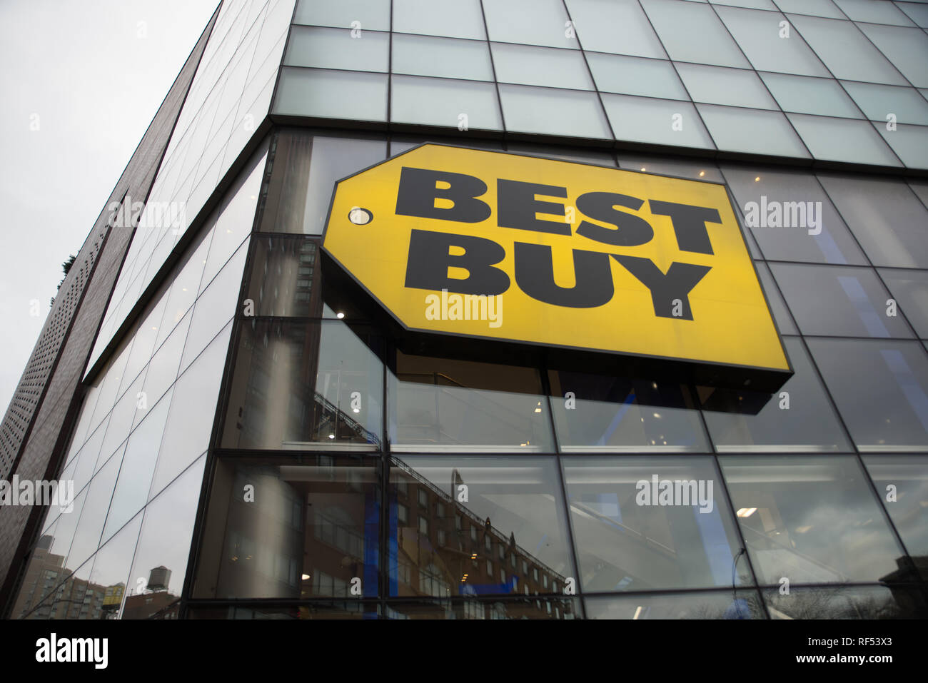 NEW YORK, NY – January 29 2010: Best Buy logo sign hanging outside store front in Union Square New York location from a down to up angle Stock Photo