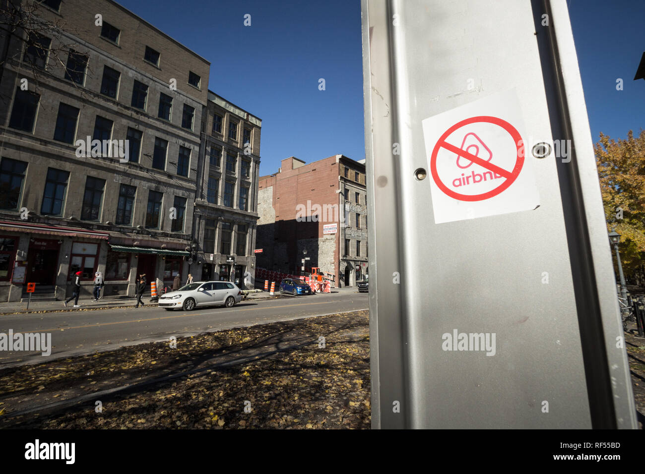 MONTREAL, CANADA - NOVEMBER 3, 2018: Anti Airbnb sticker on the main street of Montreal Port, part of a movement opposing the rental platform and the  Stock Photo