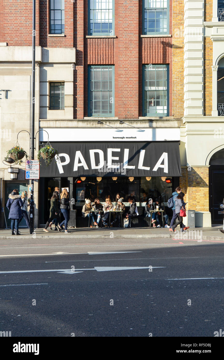 Customers surround the exterior of Padella Italian restaurant, Southwark Street, London SE, UK Stock Photo