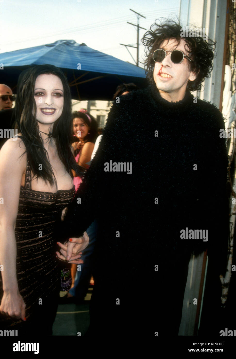 LOS ANGELES, CA - OCTOBER 31: Director Tim Burton and actress Lisa Marie  attend Tim Burton's 'The Nightmare Before Christmas' book event on October  31, 1993 in Los Angeles, California. Photo by