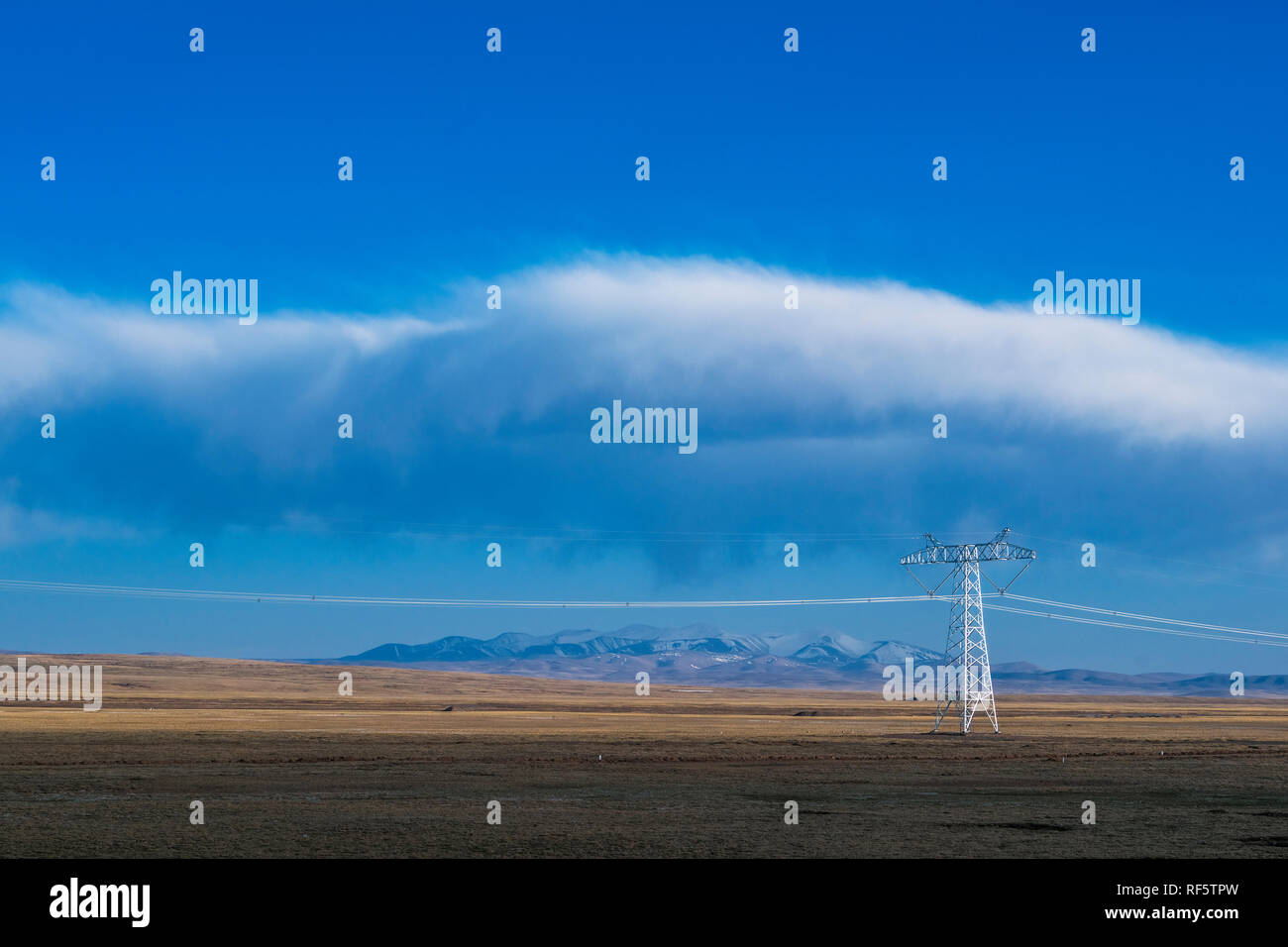 High voltage towers with sky background Stock Photo - Alamy