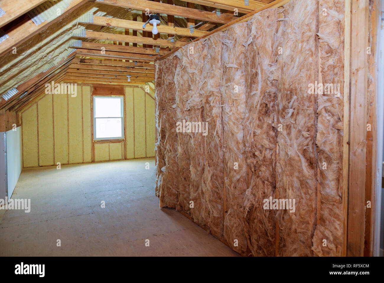 wall of an apartment building, covered with insulation foam before ...