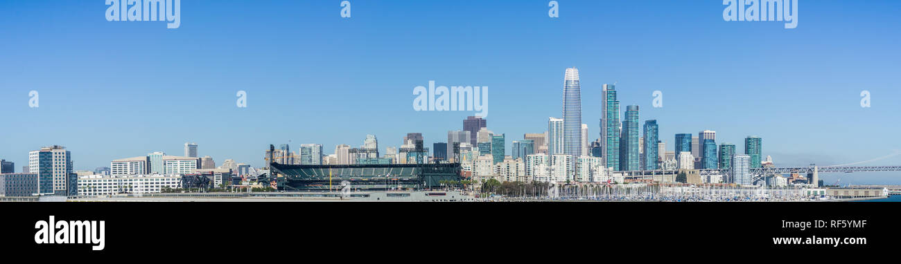 Panoramic view of San Francisco skyline as seen from the waterfront on a sunny and clear day Stock Photo
