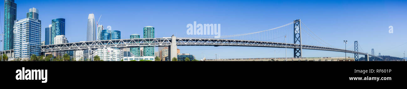 Panoramic view of the Bay Bridge spanning from the Financial District to Treasure Island on a sunny and clear day Stock Photo