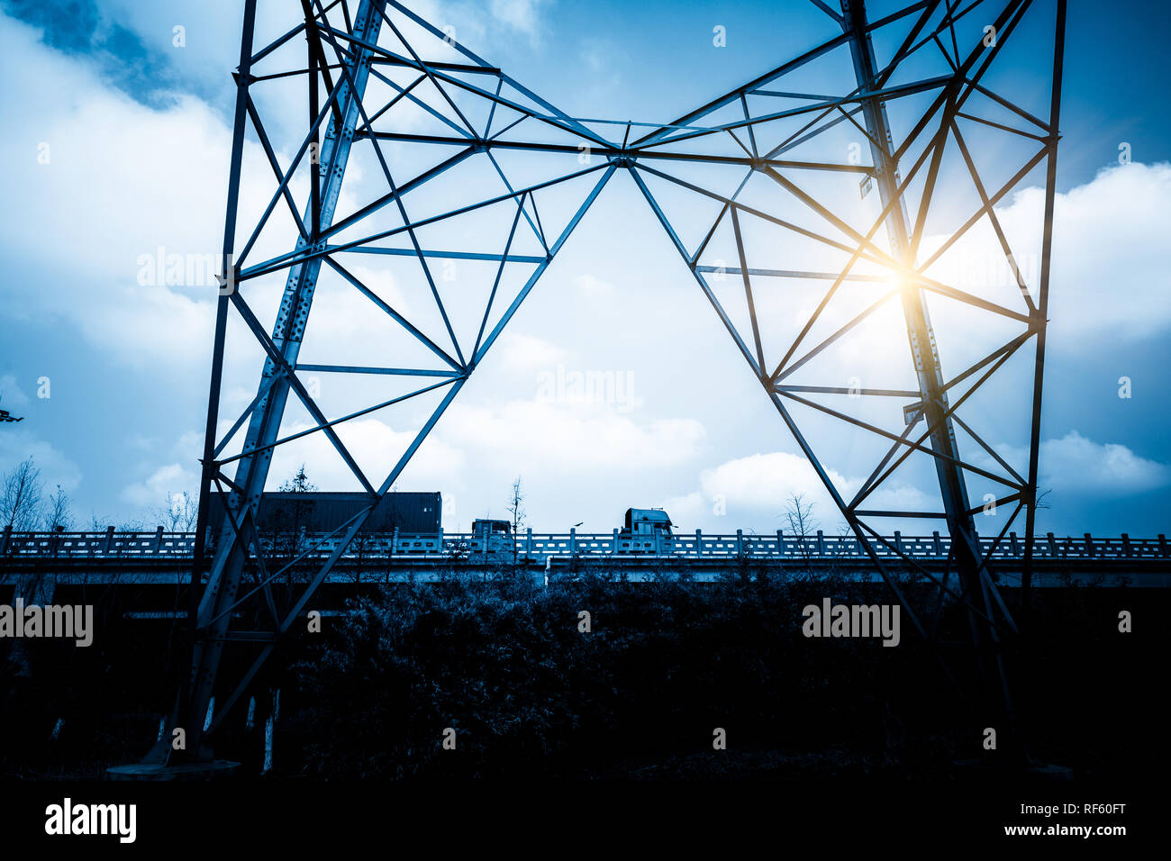 High voltage towers with sky background Stock Photo - Alamy